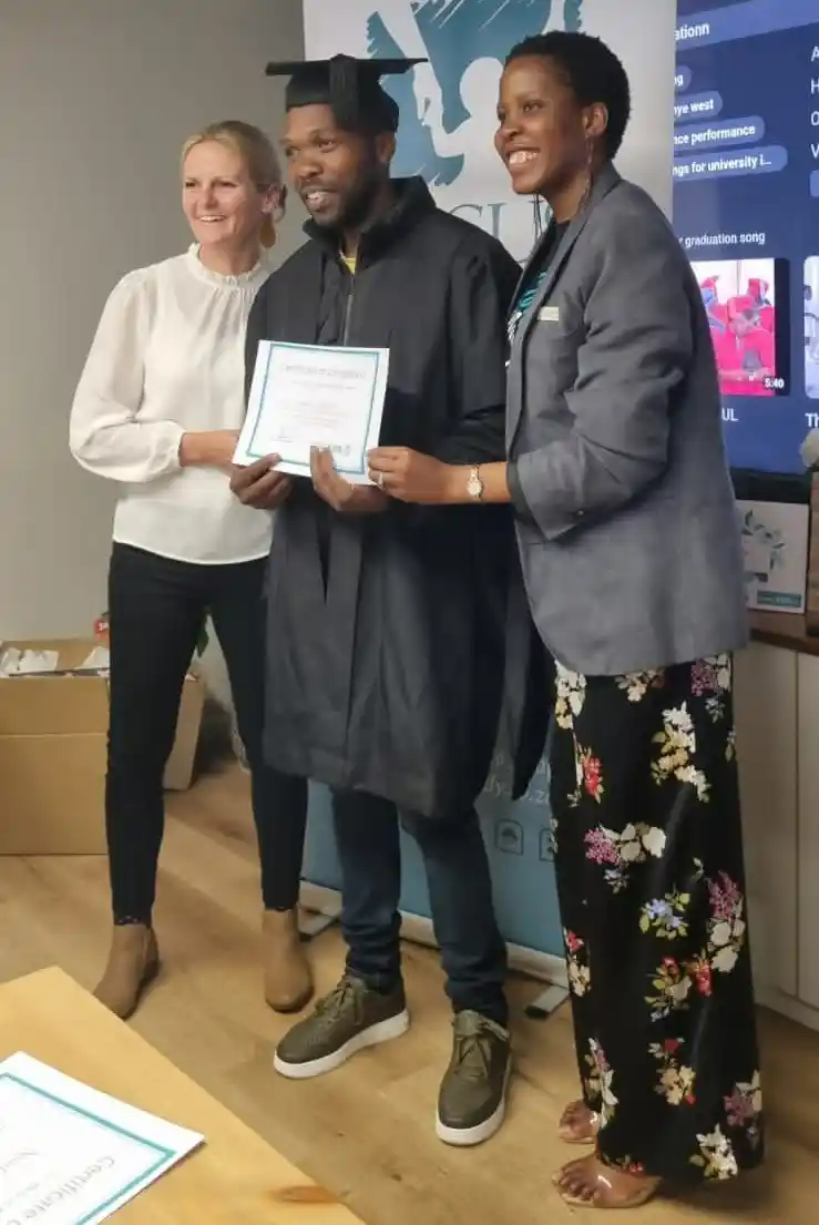 Sanele Certificate - Project Hope Six-Week Caregiver Support Program - ECD - KZN Sanele receiving his certificate of completion for a 6-week care giver course. ECD, Project Hope, KZN, South Africa