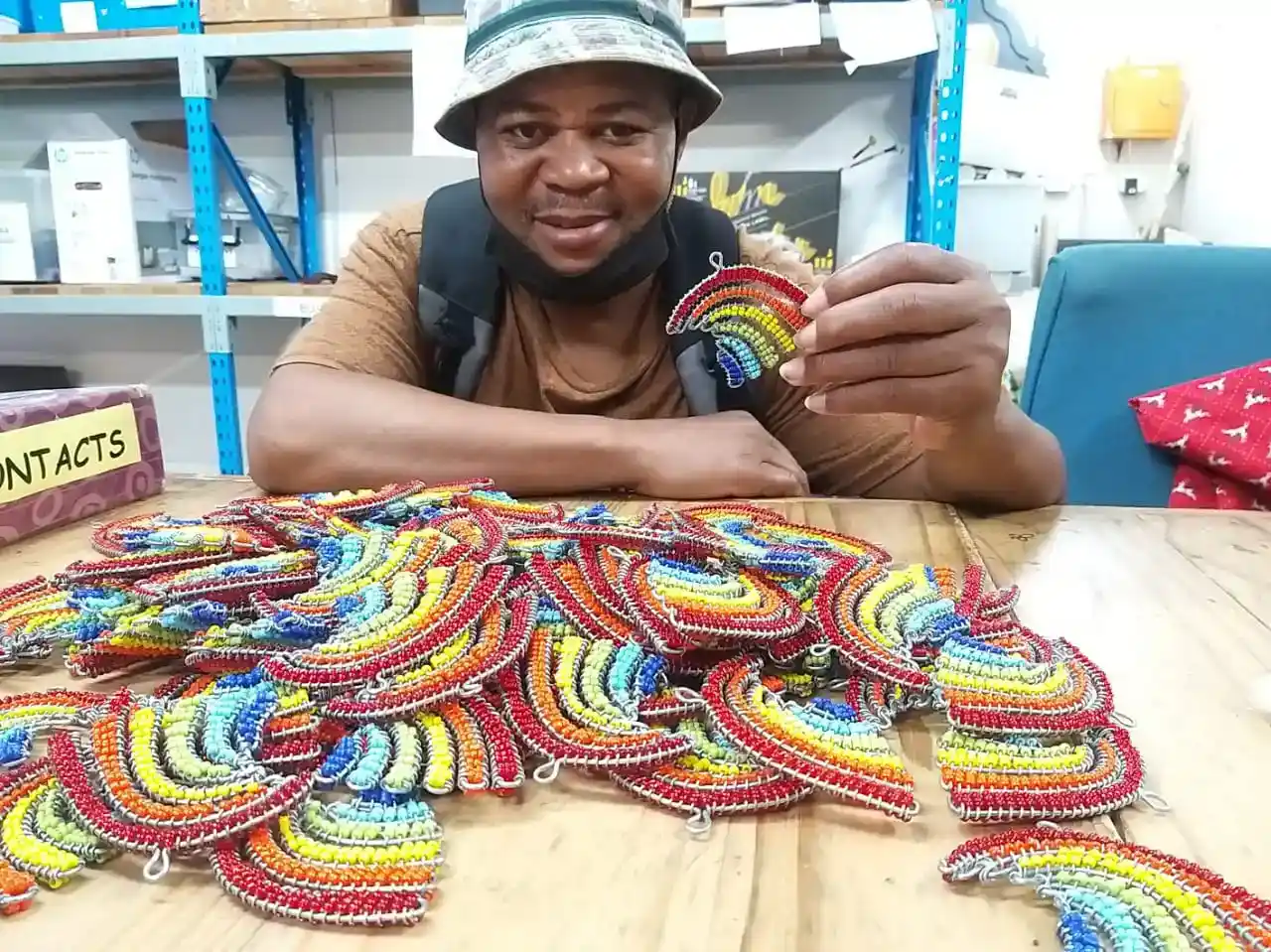 Beaded rainbow keyring created by a caregiver. Income Generation Project Hope
