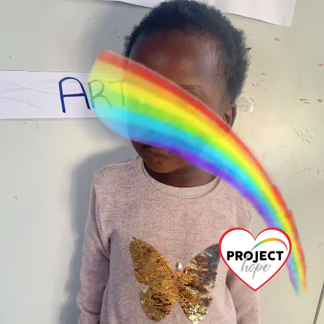 A healthy three-year-old girl named Olive who recovered from negative effects of malnutrition through early childhood development support.